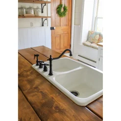 Kingston Brass Heritage Widespread Kitchen Faucet with Brass Sprayer