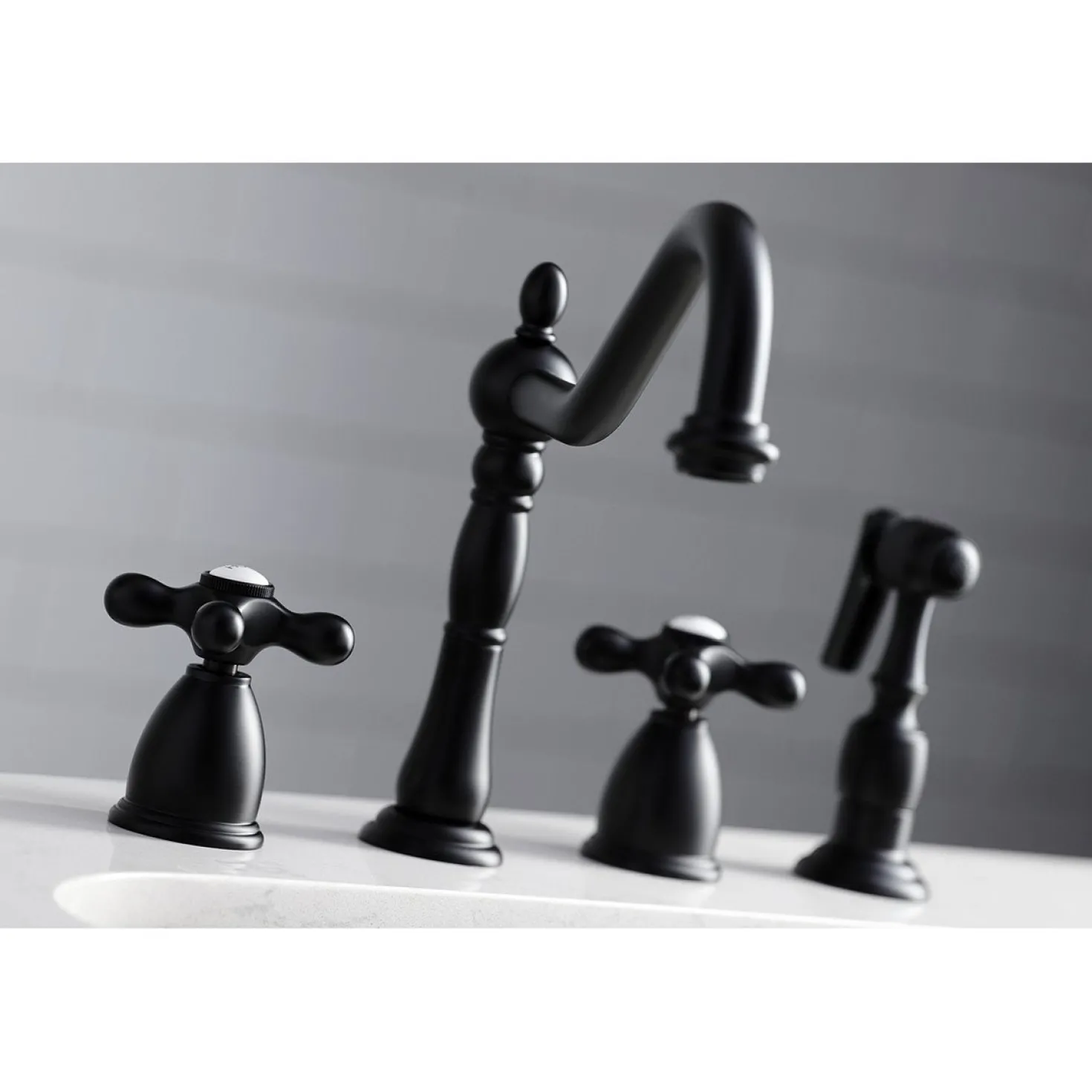 Kingston Brass Heritage Widespread Kitchen Faucet with Brass Sprayer