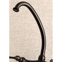 Kingston Brass 6-Inch Adjustable Center Wall Mount Laundry Faucet