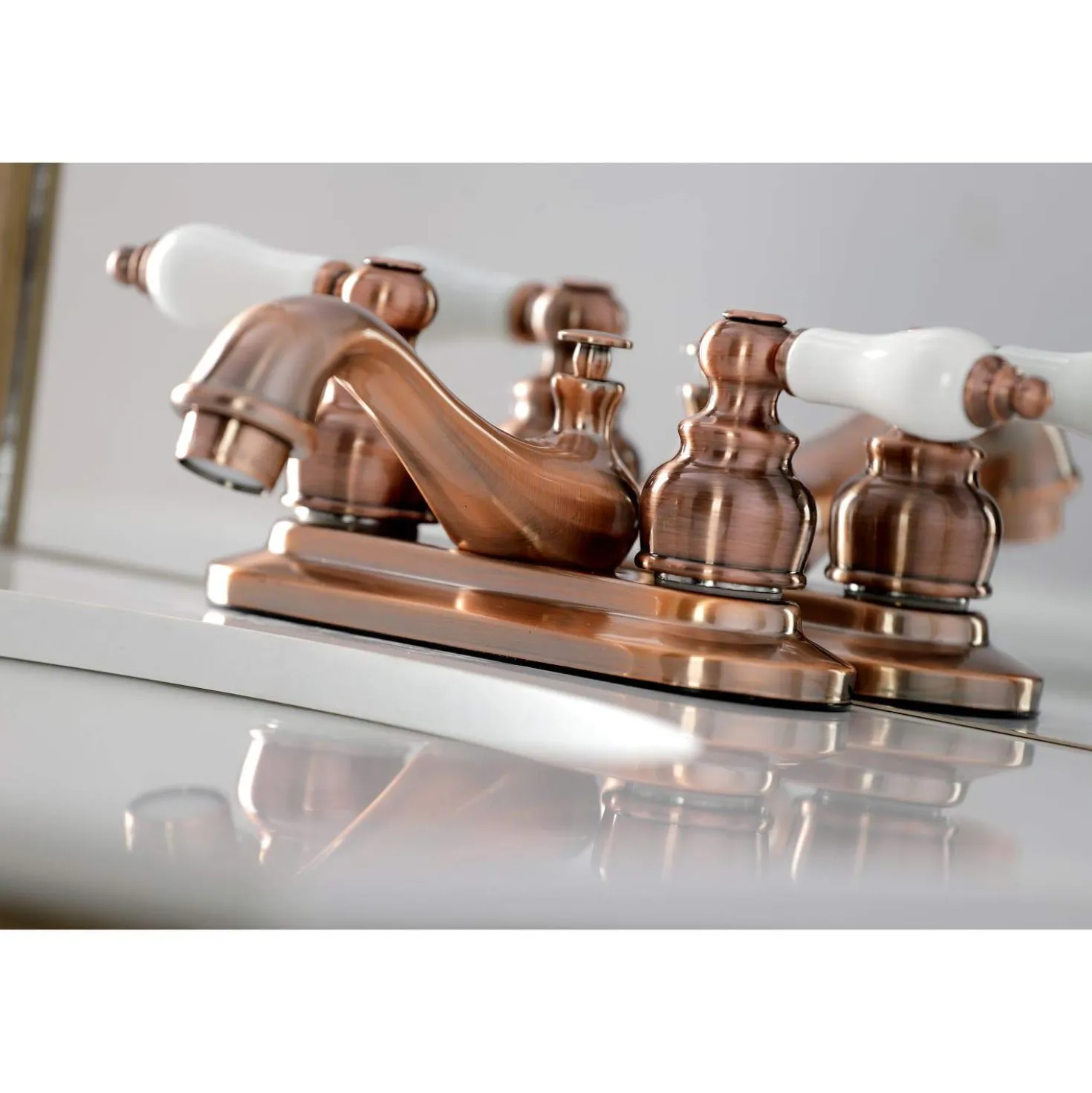 Kingston Brass KB606PL Restoration 4 in. Centerset Bathroom Faucet, Antique Copper