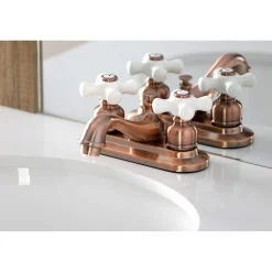 Kingston Brass KB606PX Restoration 4 in. Centerset Bathroom Faucet, Antique Copper