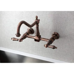 Kingston Brass KS124ALAC Heritage Two-Handle Wall Mount Bridge Kitchen Faucet, Antique Copper