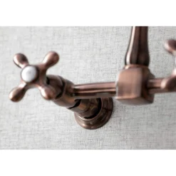 Kingston Brass KS124AXAC Heritage Two-Handle Wall Mount Bridge Kitchen Faucet, Antique Copper