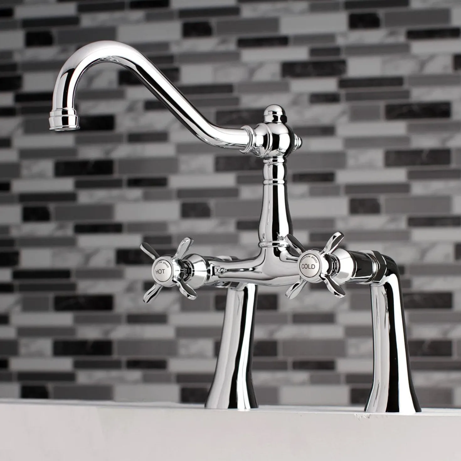 Kingston Brass KS3231BEX 7" Center Deck Mount Tub Faucet in Polished Chrome