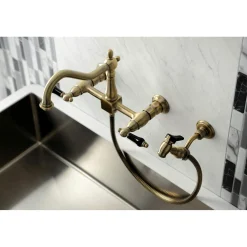 Kingston Brass KS124XPKLBS-P Duchess Two-Handle Wall Mount Bridge Kitchen Faucet with Brass Sprayer
