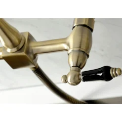 Kingston Brass KS124XPKLBS-P Duchess Two-Handle Wall Mount Bridge Kitchen Faucet with Brass Sprayer