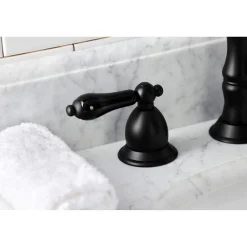 Kingston Brass KS197XPKL-P Duchess Widespread Bathroom Faucet with Brass Pop-Up