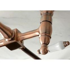 Kingston Brass KS124XPLBS-P Heritage Two-Handle Wall Mount Bridge Kitchen Faucet with Brass Sprayer