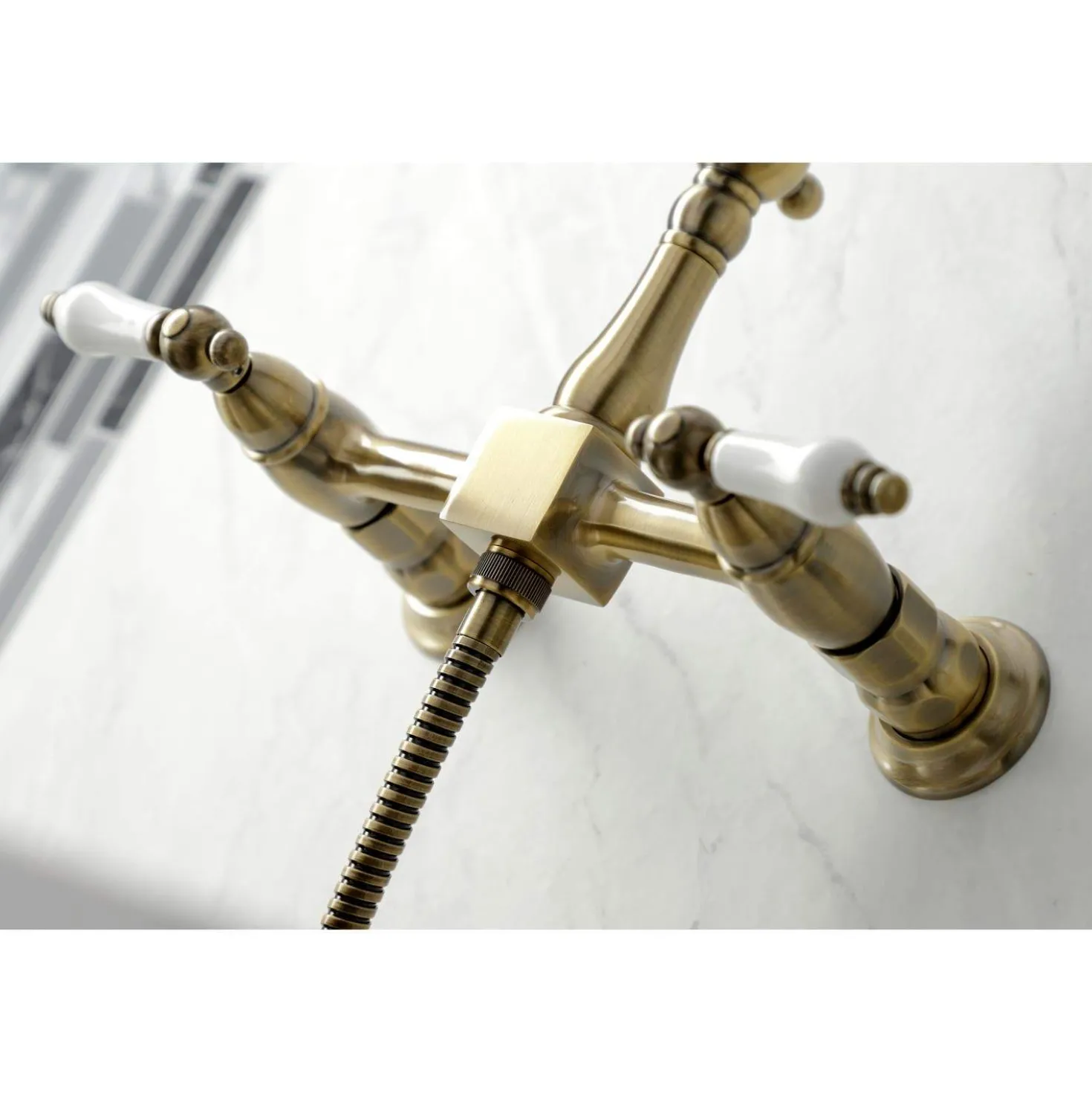 Kingston Brass KS124XPLBS-P Heritage Two-Handle Wall Mount Bridge Kitchen Faucet with Brass Sprayer