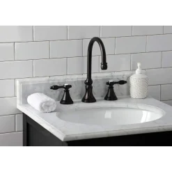 Kingston Brass KS298XTAL-P Tudor Widespread Bathroom Faucet with Brass Pop-Up