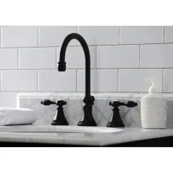 Kingston Brass KS298XTAL-P Tudor Widespread Bathroom Faucet with Brass Pop-Up