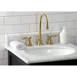 Kingston Brass KS298XTAL-P Tudor Widespread Bathroom Faucet with Brass Pop-Up