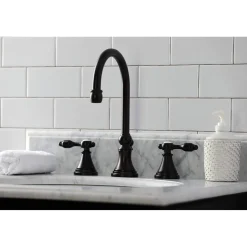 Kingston Brass KS298XTAL-P Tudor Widespread Bathroom Faucet with Brass Pop-Up