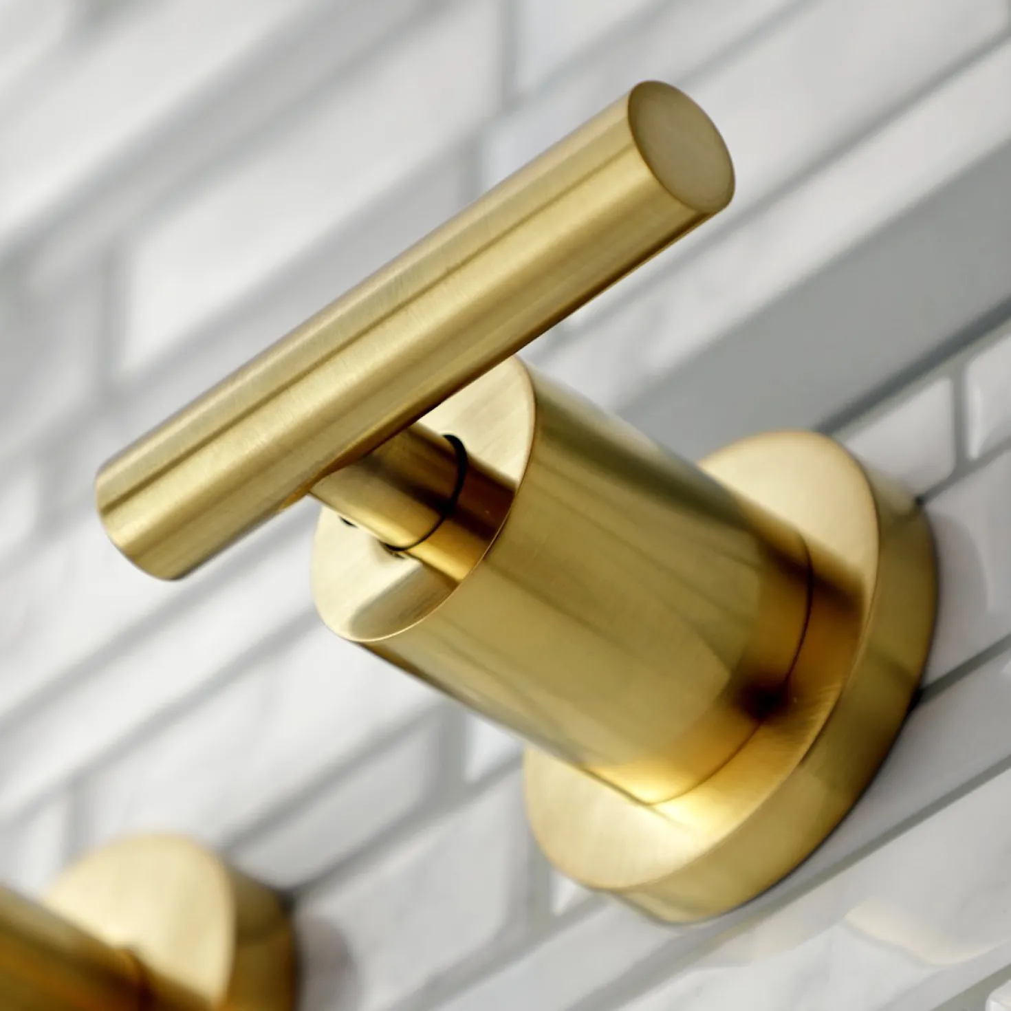 Kingston Brass Manhattan 2-Handle 8-Inch Wall Mount Bathroom Faucet