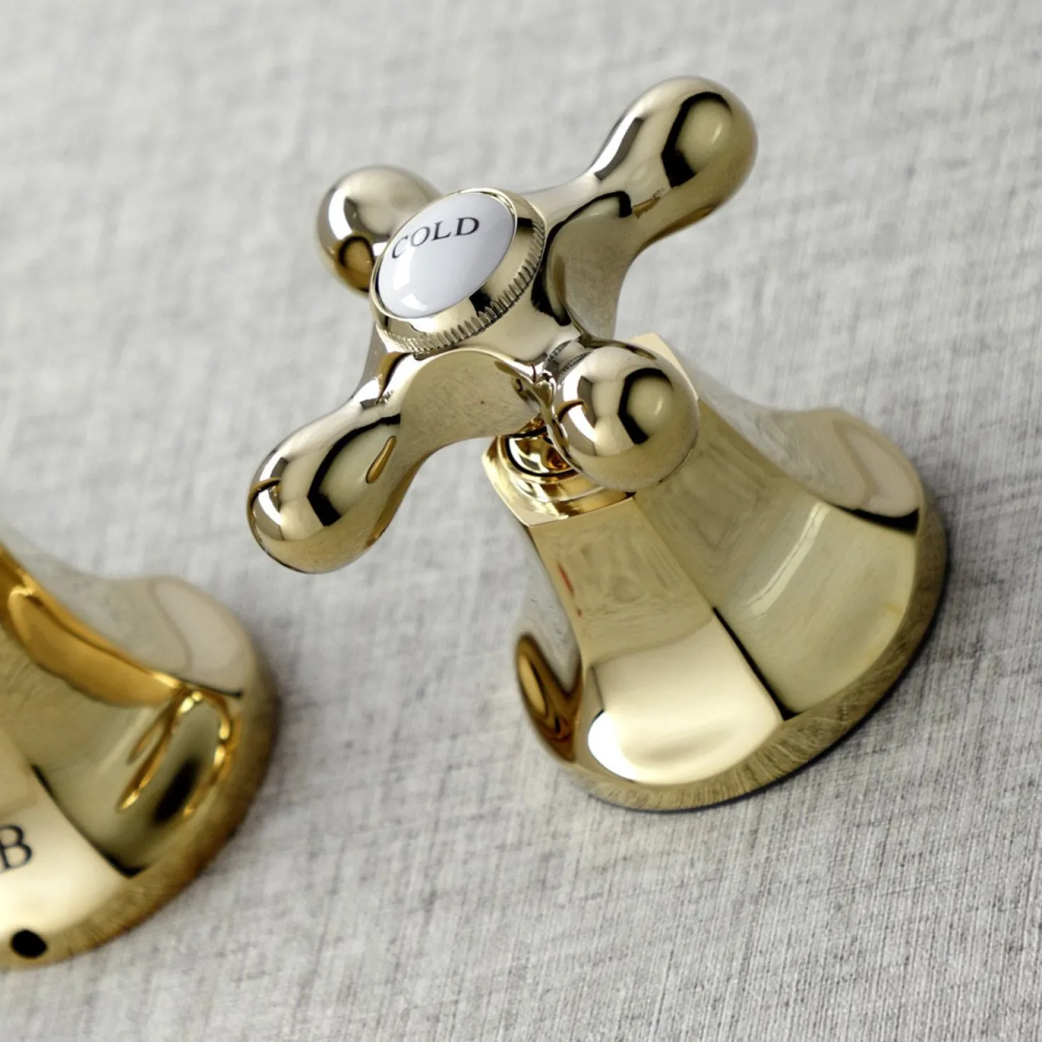 Kingston Brass Metropolitan Wall Mount Two-Handle Bathroom Faucet