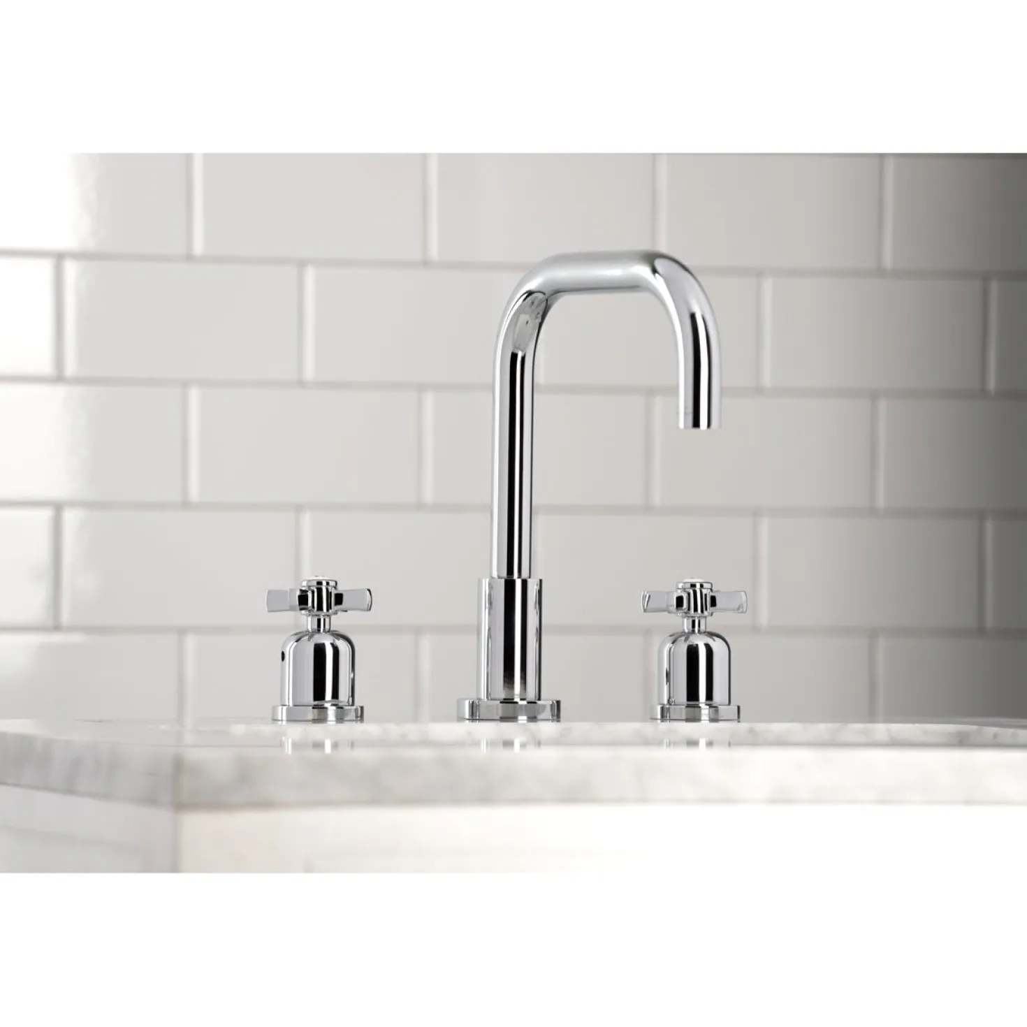 Kingston Brass Millennium Widespread Bathroom Faucet with Brass Pop-Up