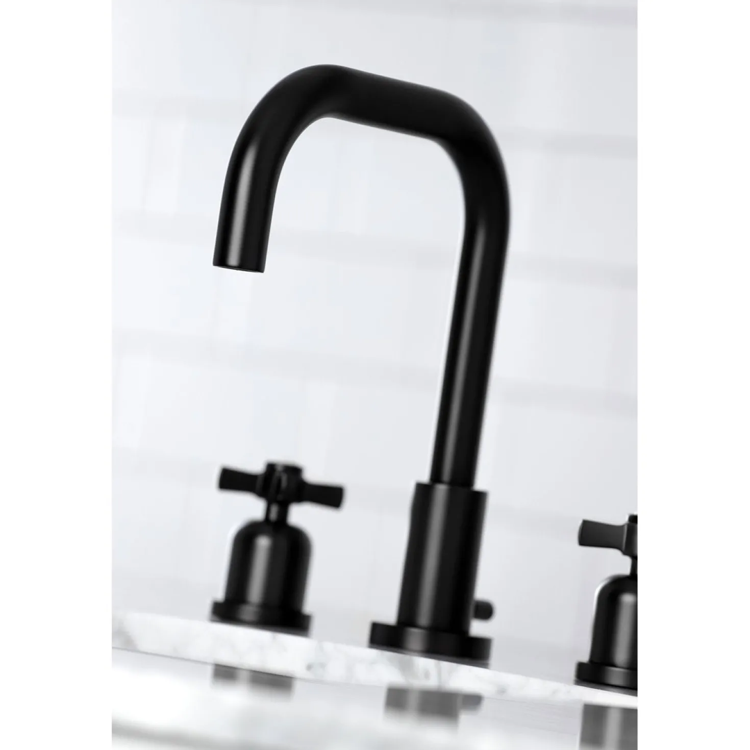Kingston Brass Millennium Widespread Bathroom Faucet with Brass Pop-Up