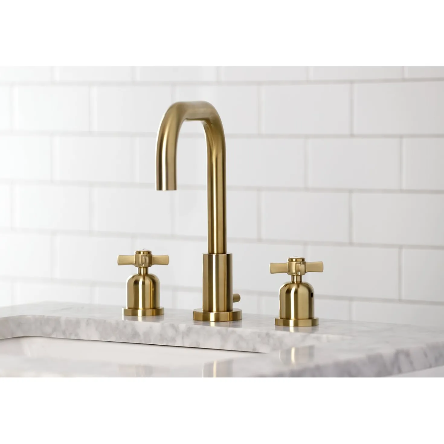 Kingston Brass Millennium Widespread Bathroom Faucet with Brass Pop-Up