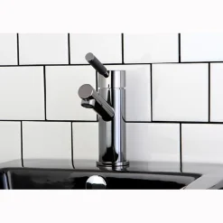 Kingston Brass NS8420DKL Water Onyx Single Handle Lavatory Faucet with Anti-Slide Handle Sleeve and Brass Pop up Drain in Black Nickel