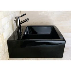 Kingston Brass NS8420DKL Water Onyx Single Handle Lavatory Faucet with Anti-Slide Handle Sleeve and Brass Pop up Drain in Black Nickel