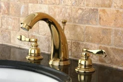 Kingston Brass NuWave French Widespread Lavatory Faucet with ABS/Brass Pop-up