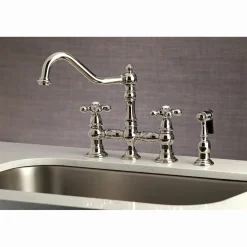 Kingston Brass Restoration 8" Bridge Kitchen Faucet with Sprayer