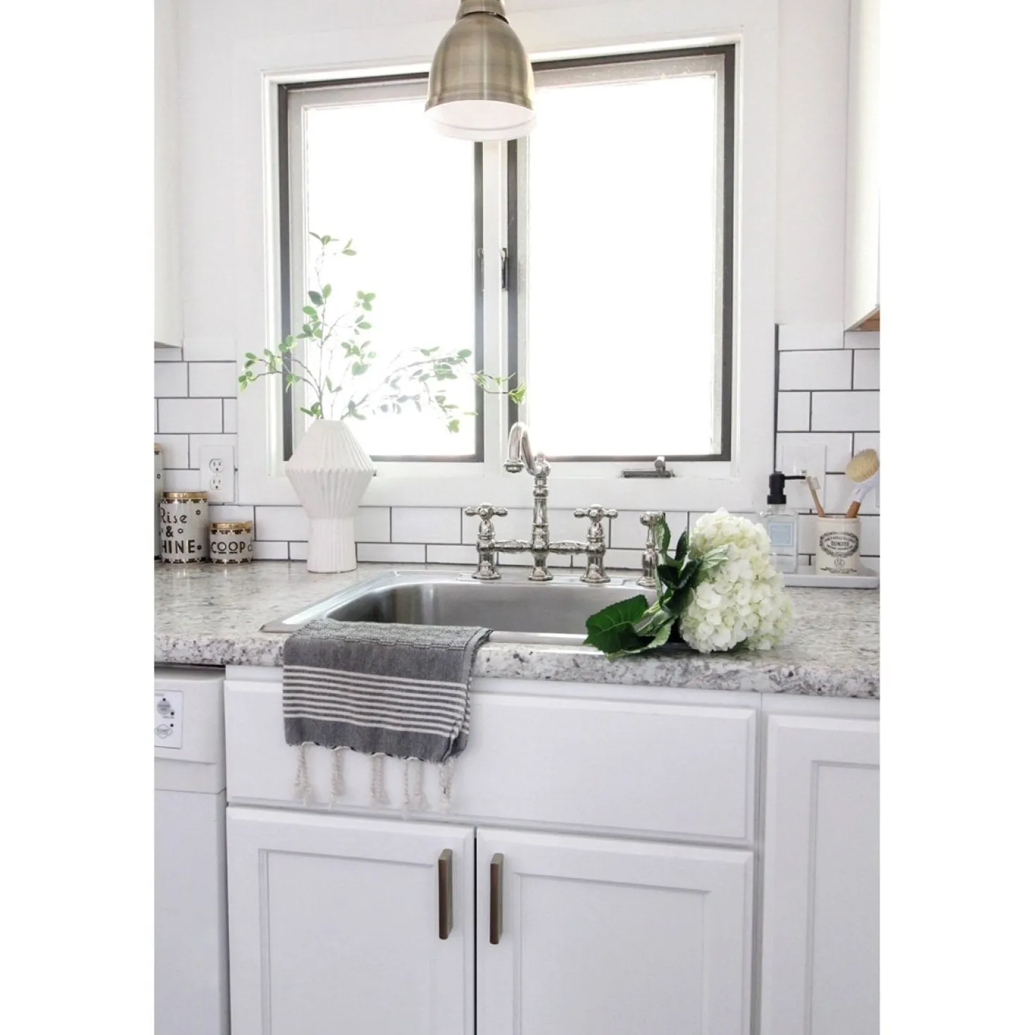 Kingston Brass Restoration 8" Bridge Kitchen Faucet with Sprayer