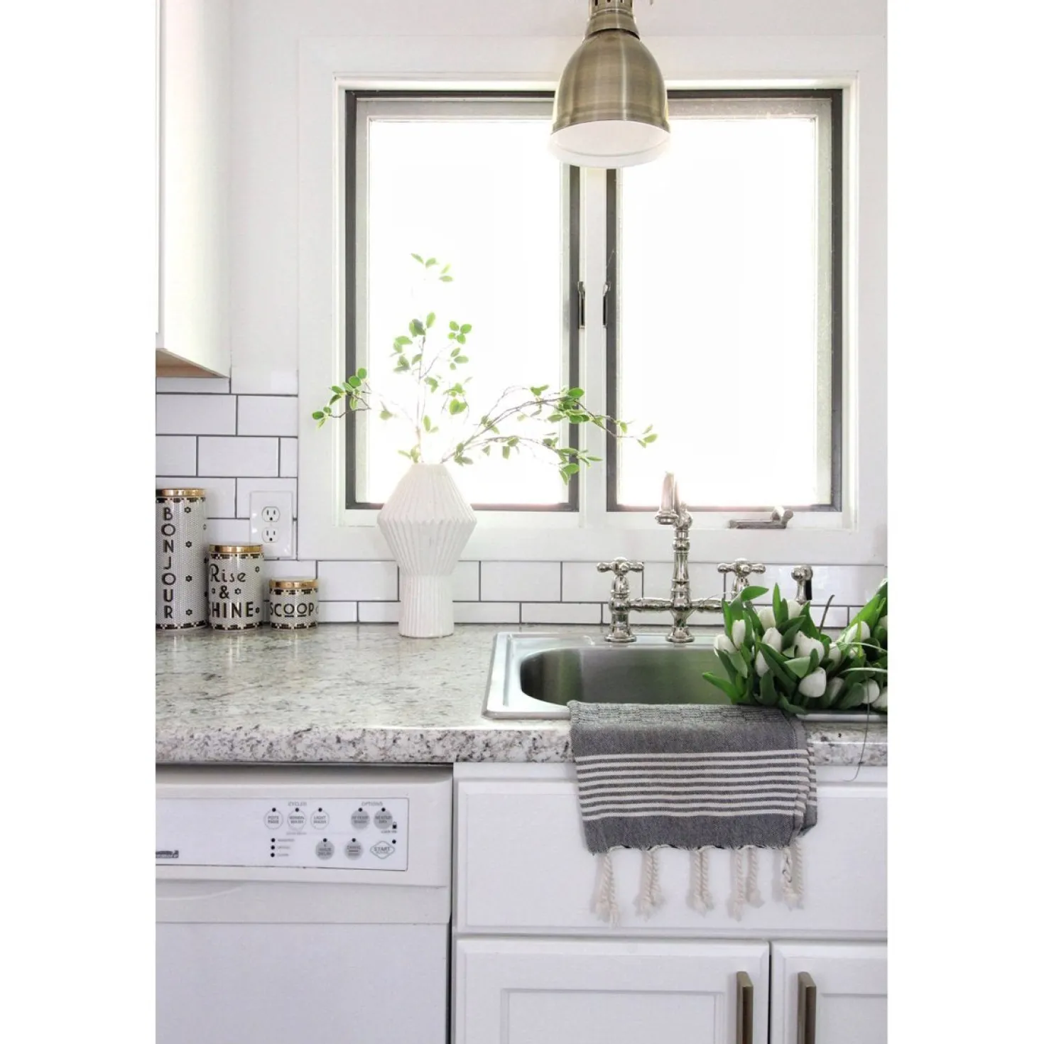 Kingston Brass Restoration 8" Bridge Kitchen Faucet with Sprayer