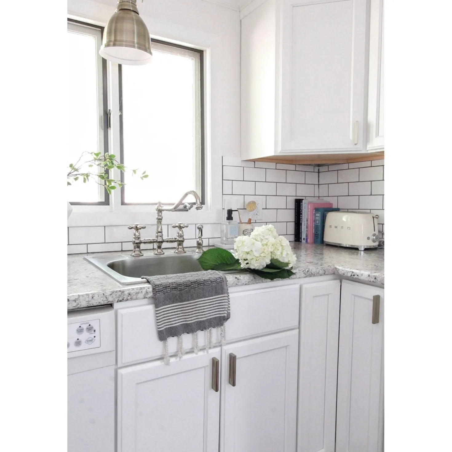 Kingston Brass Restoration 8" Bridge Kitchen Faucet with Sprayer