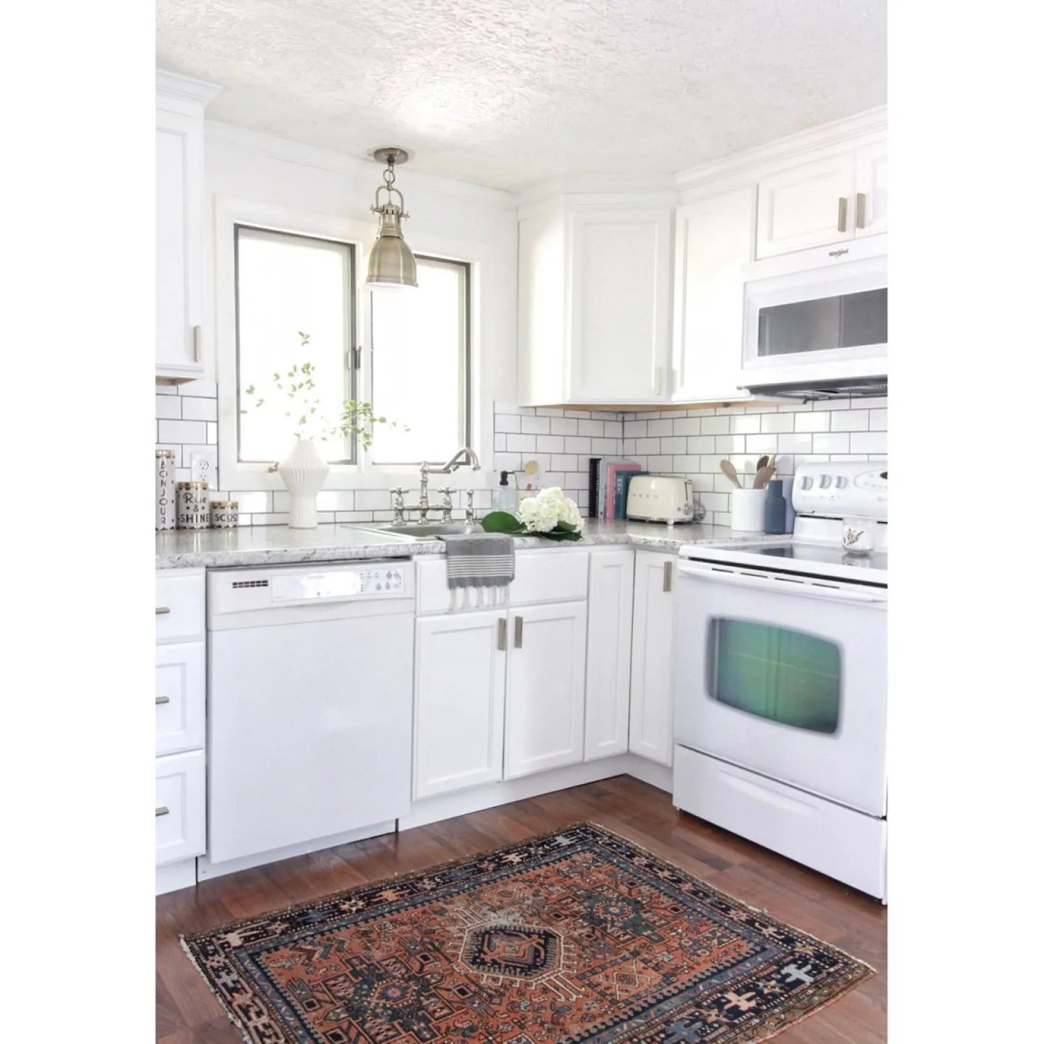Kingston Brass Restoration 8" Bridge Kitchen Faucet with Sprayer