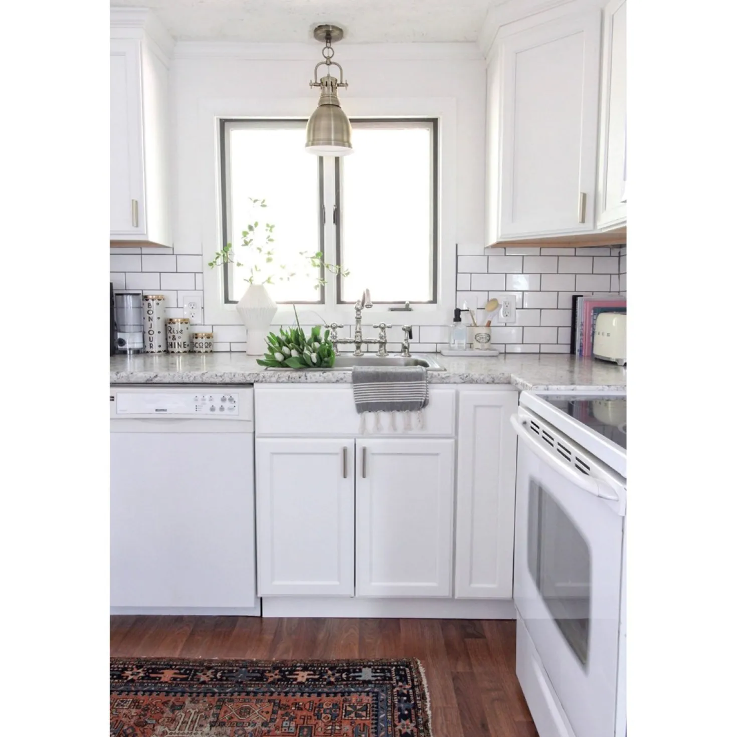 Kingston Brass Restoration 8" Bridge Kitchen Faucet with Sprayer
