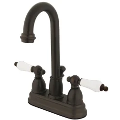 Kingston Brass Restoration Classic Two Handle 4" Centerset Lavatory Faucet with Retail Pop-up