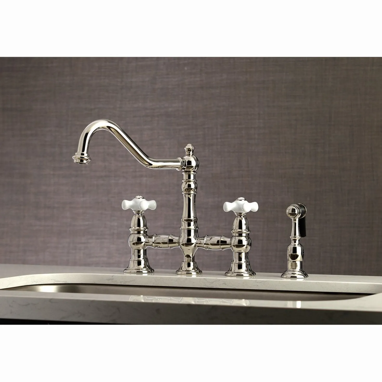 Kingston Brass Restoration Deck Mount 8" Bridge Kitchen Faucet with Sprayer