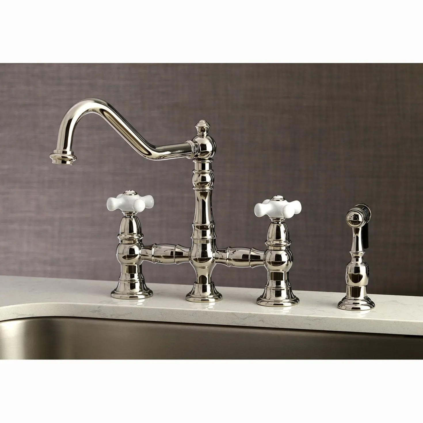 Kingston Brass Restoration Deck Mount 8" Bridge Kitchen Faucet with Sprayer