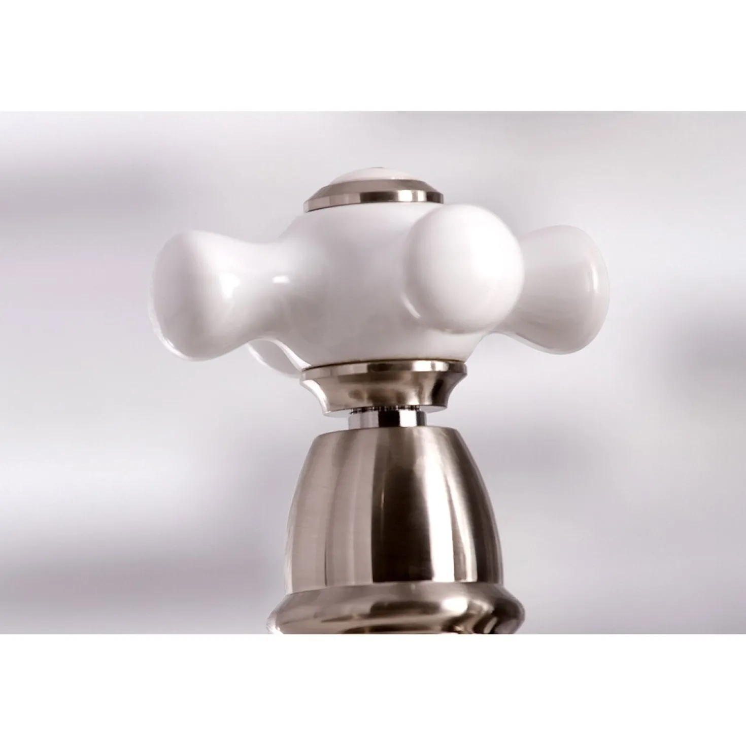 Kingston Brass Restoration Deck Mount 8" Bridge Kitchen Faucet with Sprayer