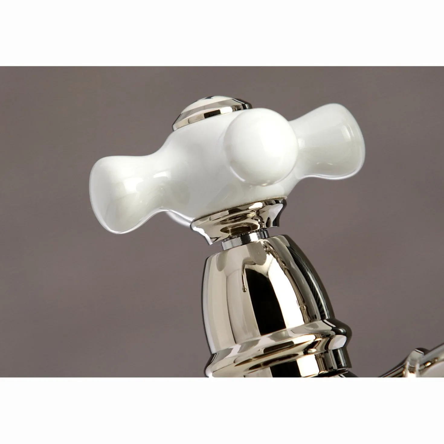 Kingston Brass Restoration Deck Mount 8" Bridge Kitchen Faucet with Sprayer