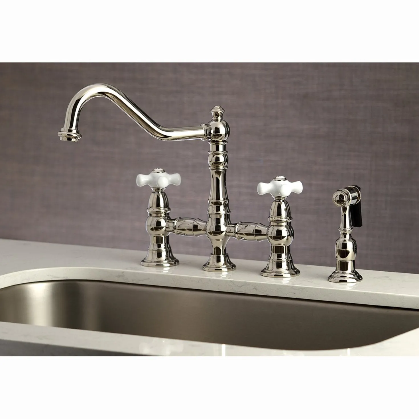 Kingston Brass Restoration Deck Mount 8" Bridge Kitchen Faucet with Sprayer