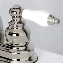 Kingston Brass Restoration Deck Mount 4-Inch Centerset Bathroom Faucet