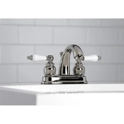 Kingston Brass Restoration Deck Mount 4-Inch Centerset Bathroom Faucet