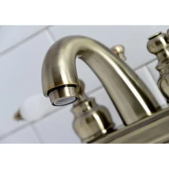 Kingston Brass Restoration Deck Mount 4-Inch Centerset Bathroom Faucet