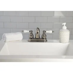 Kingston Brass Restoration Deck Mount 4-Inch Centerset Bathroom Faucet