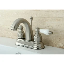 Kingston Brass Restoration Deck Mount 4-Inch Centerset Bathroom Faucet