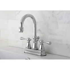 Kingston Brass Restoration Deck Mount 4-Inch Centerset Bathroom Faucet with Brass Pop-Up