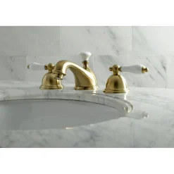 Kingston Brass Restoration Deck Mount 8-Inch Widespread Bathroom Faucet
