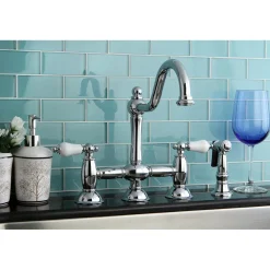 Kingston Brass Restoration 2-Handle Kitchen Bridge Faucet with Brass Sprayer