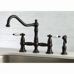 Kingston Brass Restoration 8-Inch Bridge Kitchen Faucet with Sprayer