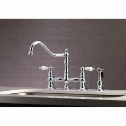 Kingston Brass Restoration 8-Inch Bridge Kitchen Faucet with Sprayer