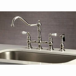 Kingston Brass Restoration 8-Inch Bridge Kitchen Faucet with Sprayer