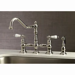 Kingston Brass Restoration 8-Inch Bridge Kitchen Faucet with Sprayer