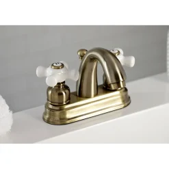 Kingston Brass Restoration 4-Inch Centerset Deck Mount Bathroom Faucet